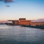 landscape photography of concrete building near river